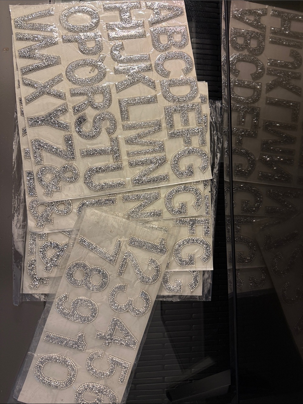 Bling adhesive letters, complete alphabet + & on each sheet.